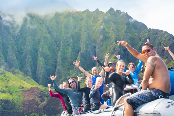 group on a rafting tour on the Na Pali Coast with Kauai Sea Tours