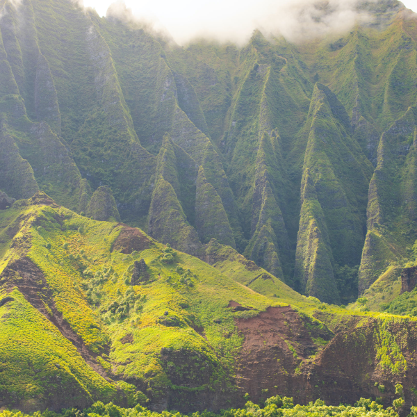 a body of water with a mountain in the background