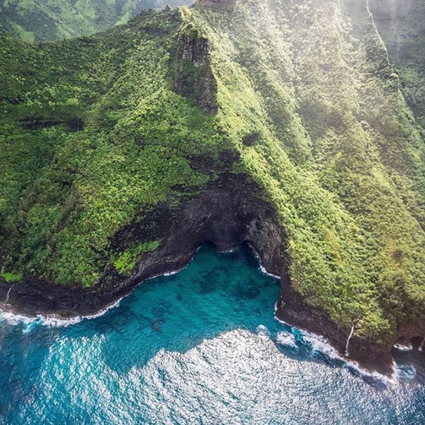 water next to a mountain