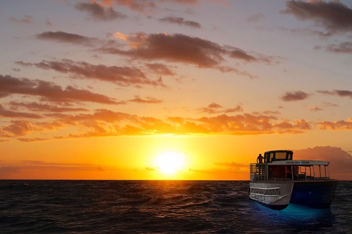 a sunset over a body of water