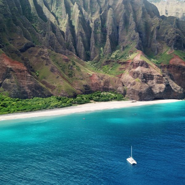 a body of water with a mountain in the background