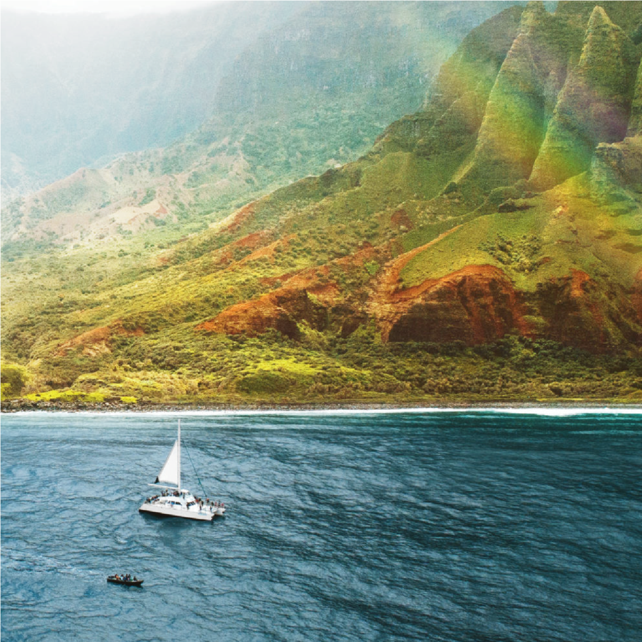 a small boat in a body of water with a mountain in the background