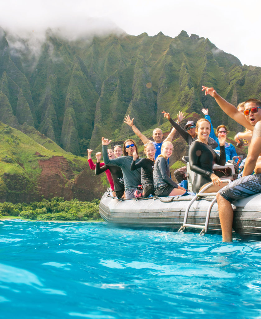 a group of people in a pool of water