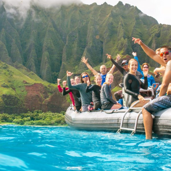 a group of people in a pool of water