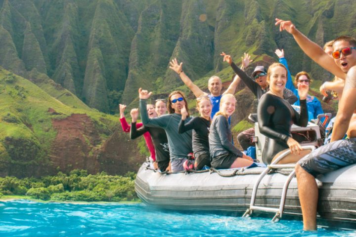 a group of people in a pool of water