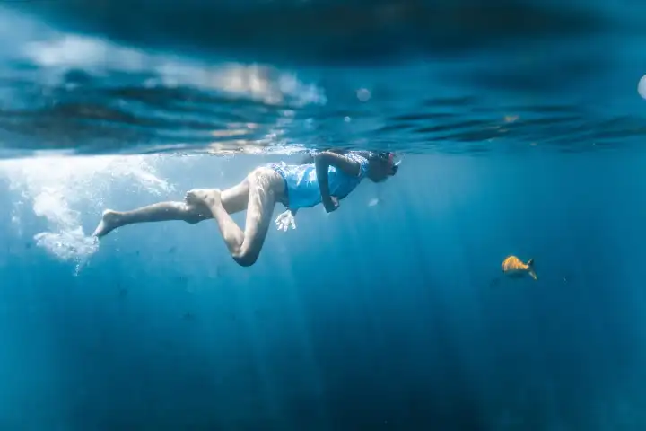 a person swimming in the water