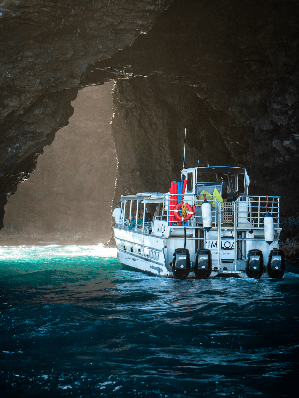 a small boat in a body of water