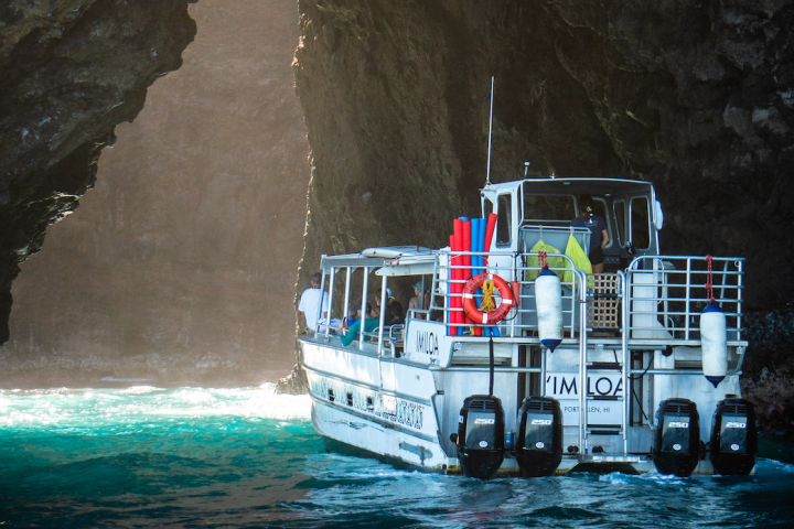 a small boat in a body of water