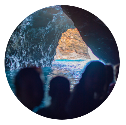 View from inside a cave looking out to the sea and light.